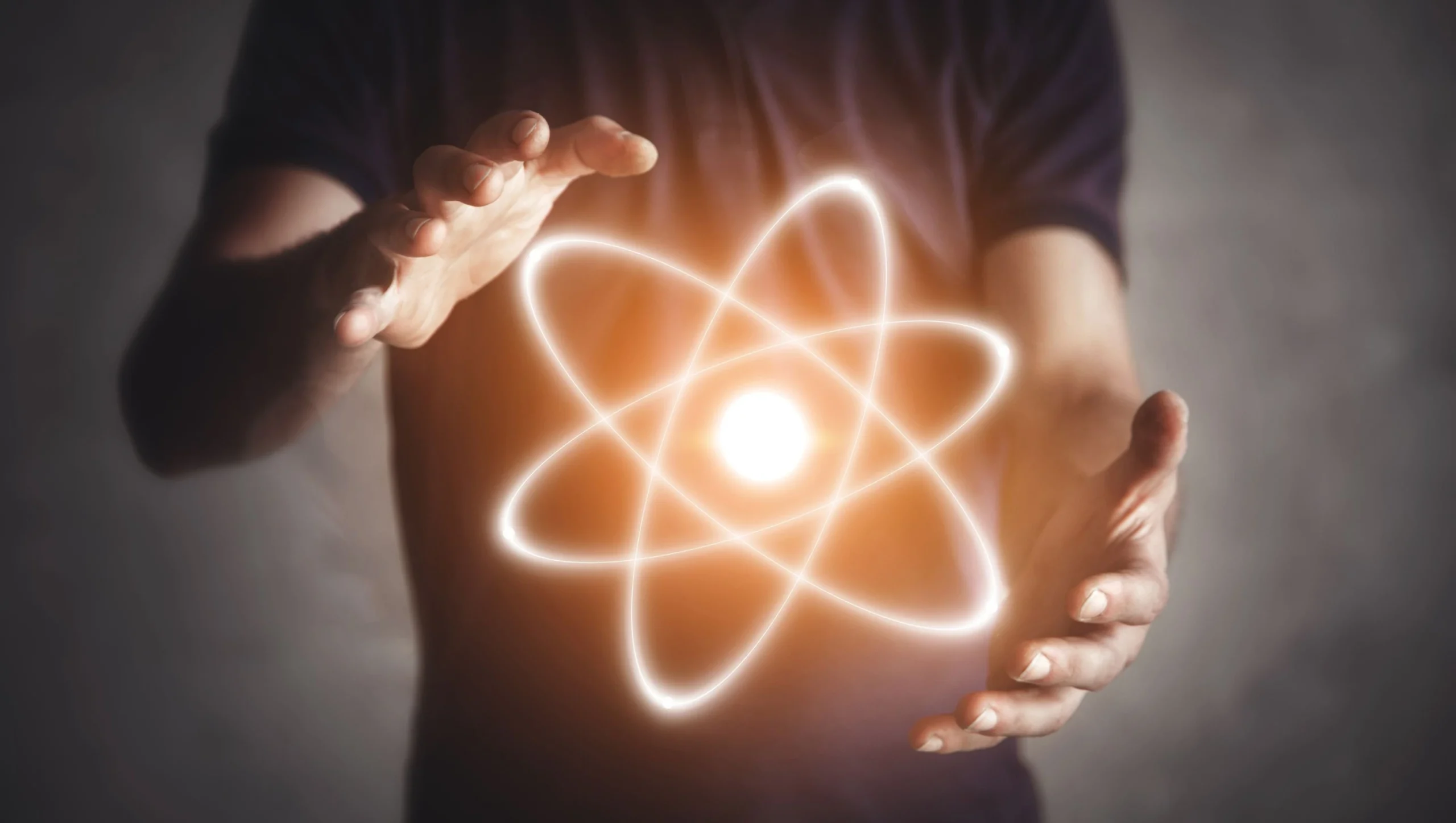Abstract image of energy waves radiating around a meditating person